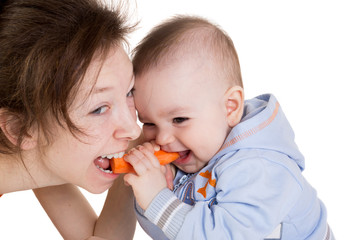 Mother and child laughing and play together