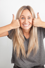 Portrait of a young blond woman smiling