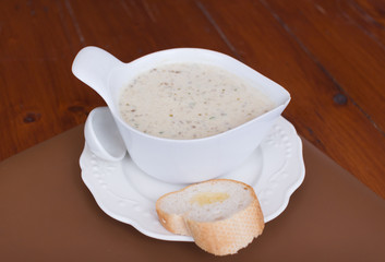 mushroom cream soup setting on wood table