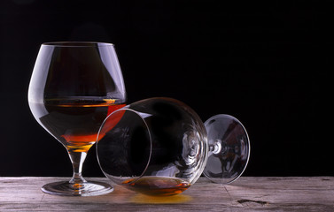 Cognac or brandy on a wooden table