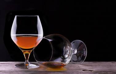 Cognac or brandy on a wooden table