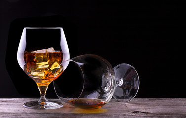 Cognac or brandy on a wooden table