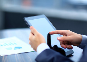 Businessman holding digital tablet