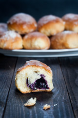 Sweet bun with blueberries jam