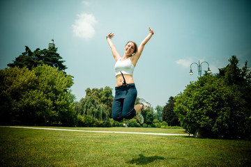 Fototapeta na wymiar beautiful woman fitness jumping