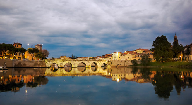 tiberius bridge twilight night view. Rimini Italy