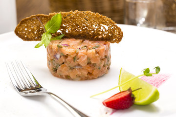 meat salmon with lemon on a table in a restaurant