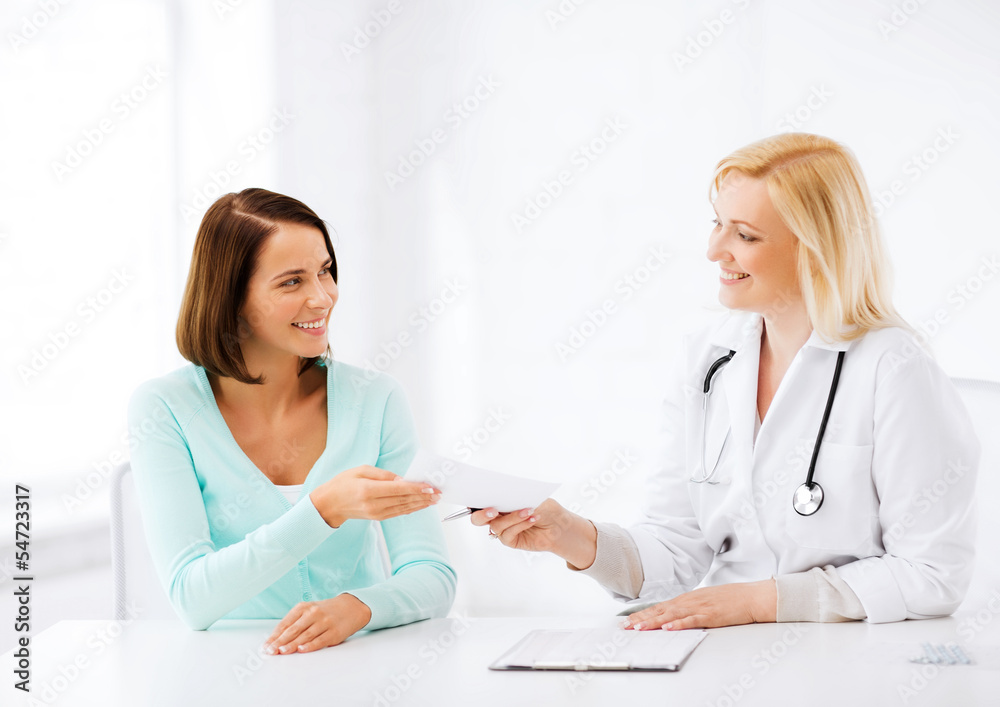 Canvas Prints doctor giving prescription to patient in hospital