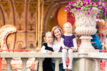 Obraz na płótnie Canvas Happy family: mother with daughters