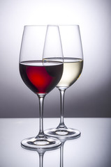 Red Wine and White Wine in Crystal Glasses Back Lit