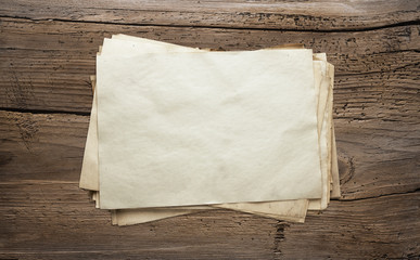 old papers on wooden background