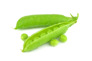 Fresh wet peas in a pod on a white background