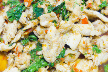 thai spicy food,fried chicken with basil leaves