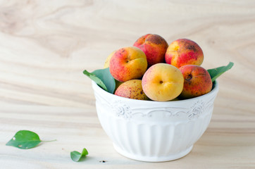 .Fresh apricots in a bowl