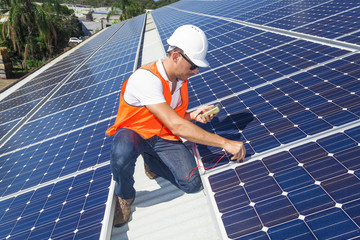 Solar panels with technician