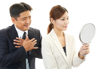 笑顔のビジネスマンとOL