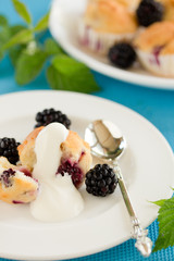 Muffins with blackberries.