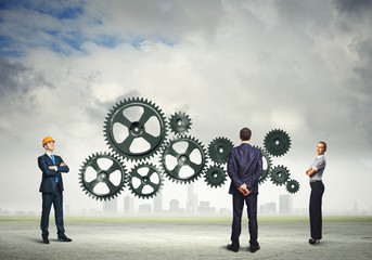 Business people and mechanism elements