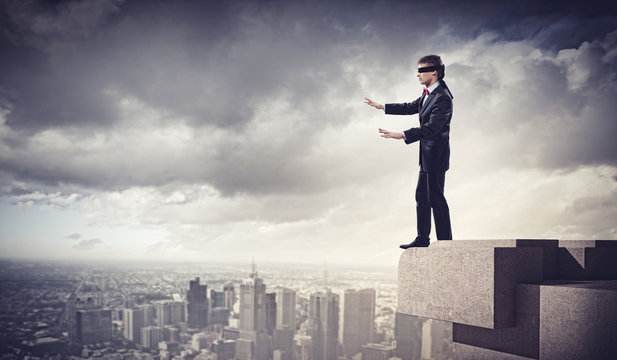 Businessman In Blindfold