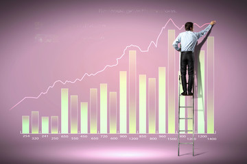businessman drawing diagram