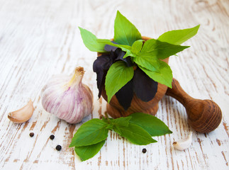 Mortar and pestle, with fresh herbs