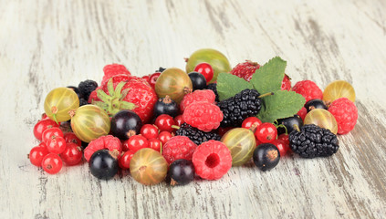 Naklejka na ściany i meble Ripe berries on table close-up