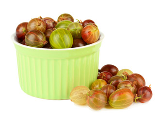 Fresh gooseberries in bowl isolated on white