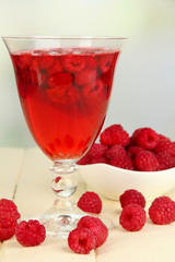 Jelly with fresh berries on wooden table