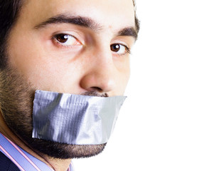 Businessman with duct tape on mouth