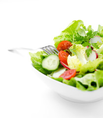 fresh salad with fork closeup