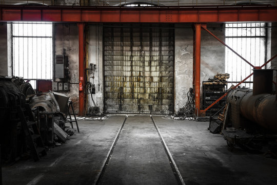 old metal gate in vehicle repair station