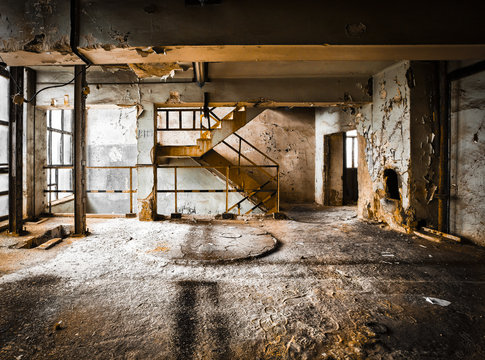 ruined brick wall of old factory spaces inside