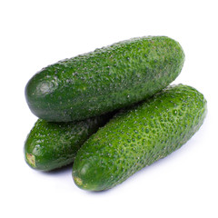 Healthy food. The green cucumbers isolated on white background
