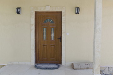 A front decorative wood door in country house