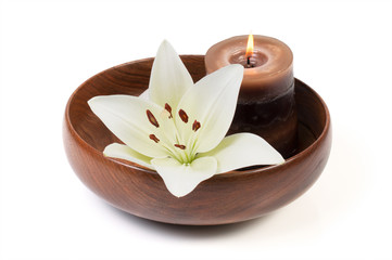 spa decoration in a wooden bowl on a white background