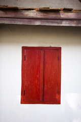 Old red window in laos