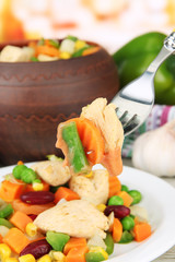Baked mixed vegetable with chicken breast in pot,