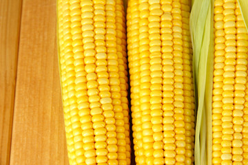 Crude corns on wooden table