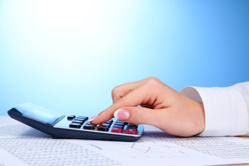 Closeup of businesswoman hand, working in office room
