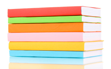 Stack of multicolor books  isolated on white