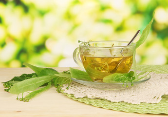 Glass cup of tea with linden
