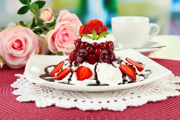 Tasty jelly dessert with fresh berries, on bright background