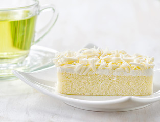 Cup of herbal tea and fresh cake