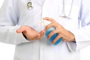 Medical doctor using sanitizer dispenser