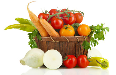 Fresh vegetables in basket isolated on white