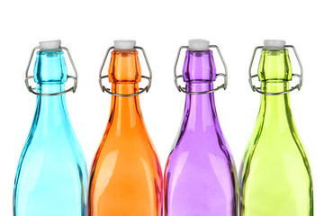 Colorful bottles isolated on white