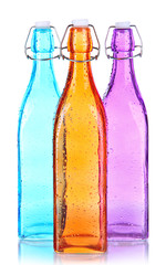 Colorful bottles isolated on white