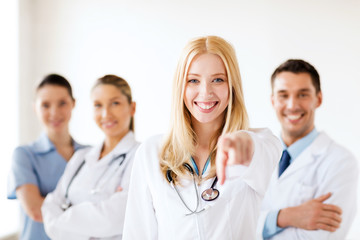 female doctor in front of medical group