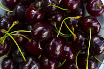 cherries in old porcelain bowl