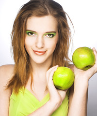 Young woman with green apple